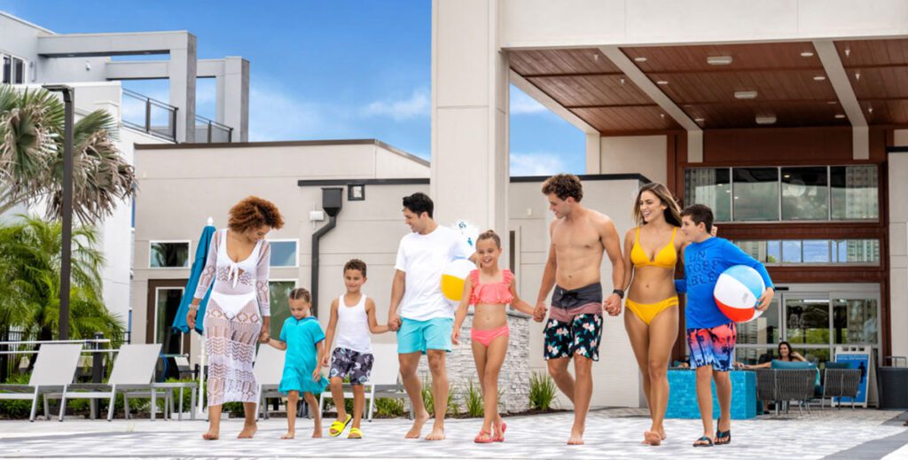 family at Spectrum+ pool